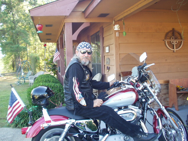 Mel riding his Harley